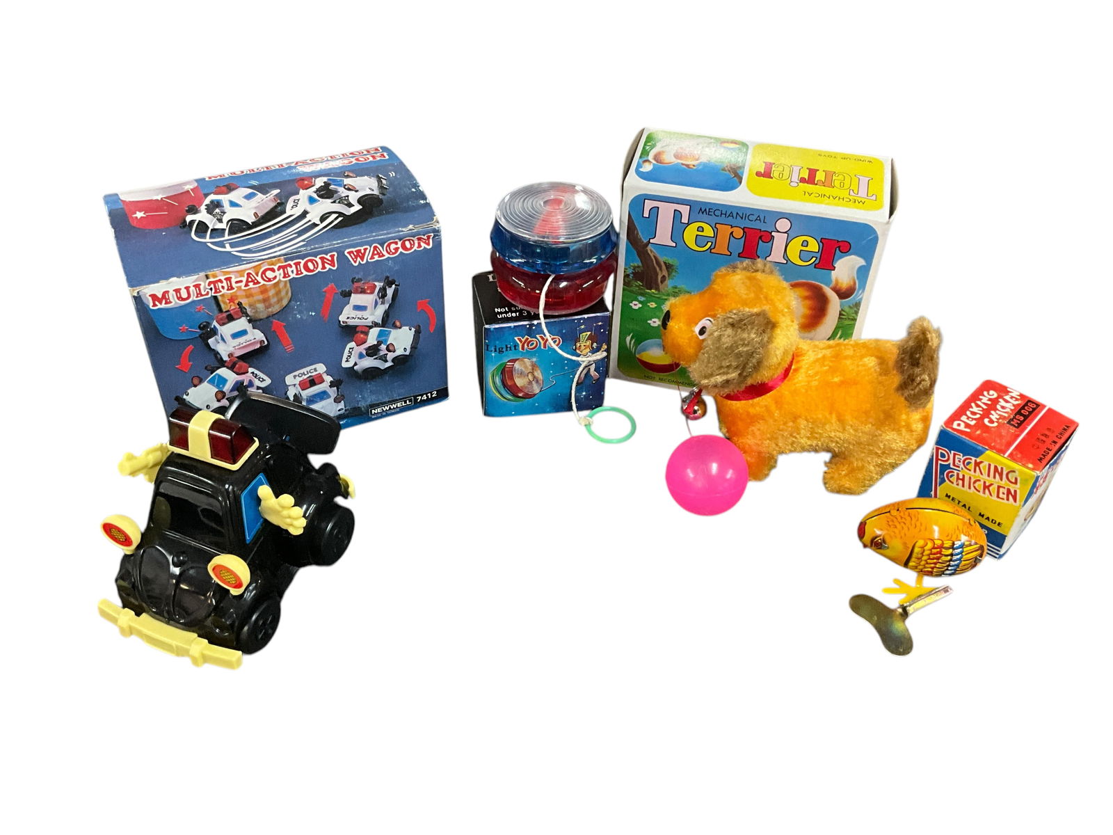 Group of Four Wind-up, Key Wind, and Battery Powered Toys (1 of 19)