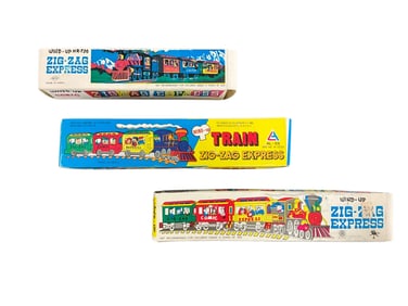 Three Wind-up Trains in Original Boxes
