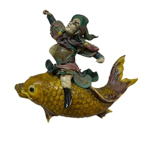 Ceramic Asian Warrior Riding a Koi or Carp