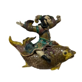 Ceramic Asian Warrior Riding a Koi or Carp