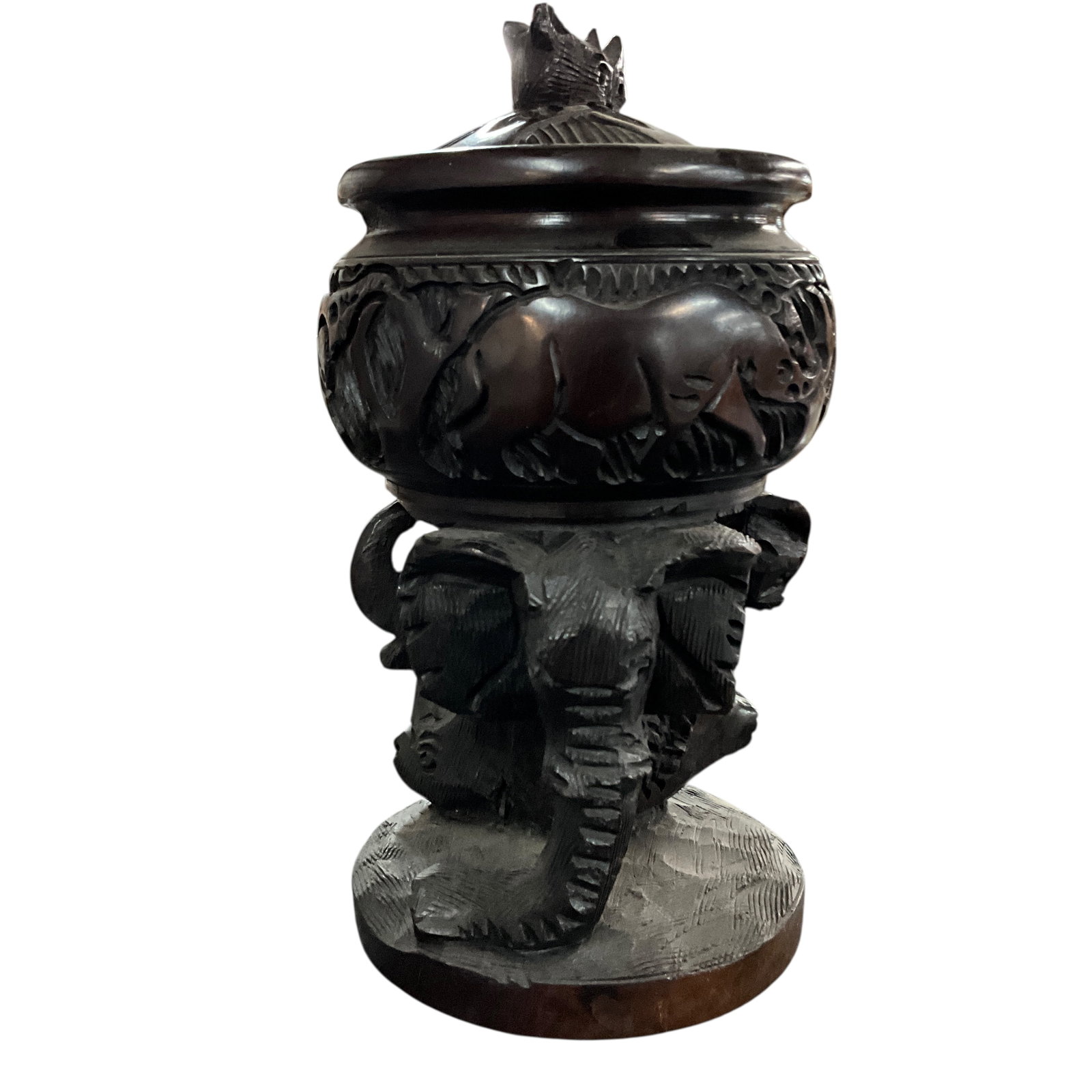 Carved African Game Pedestal Covered Bowl: Carved African Game Pedestal Covered Bowl. Carved game heads, including elephant, rhinoceros, cape buffalo, lion. Bowl ha border of game animals carved in relief; lid has rhinoceros head knob.