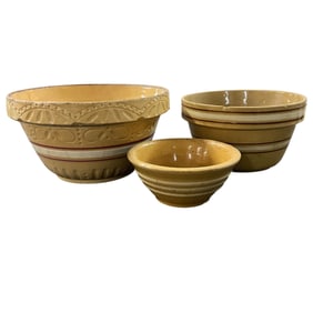 Group of Three Nested Yellow Ware Mixing Bowls