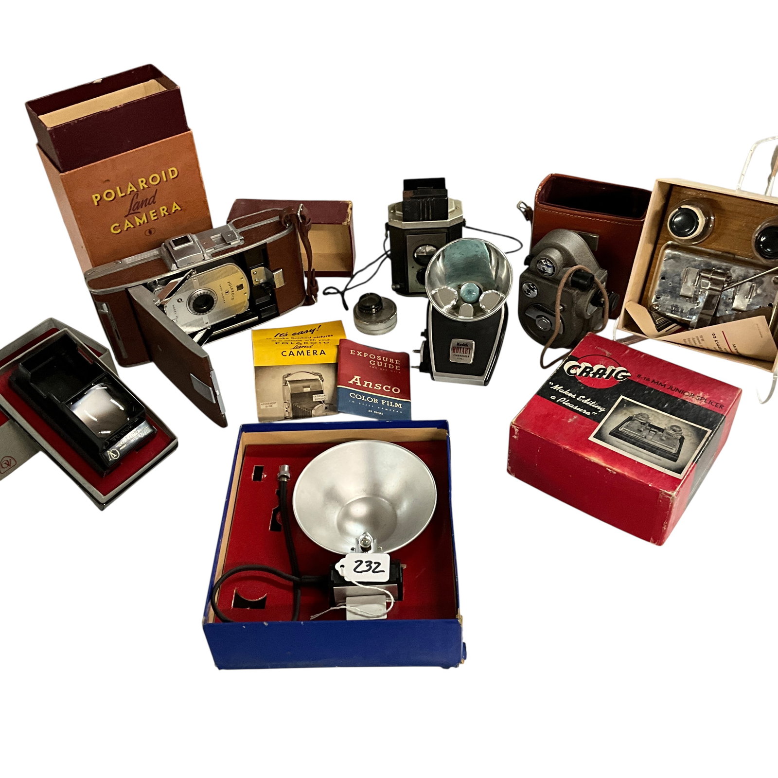 Group of Antique/Vintage Cameras and Photographic Equipment: Group of Antique/Vintage Cameras and Photographic Equipment- Polaroid, Kodak, Revere 8MM Movie camera.
