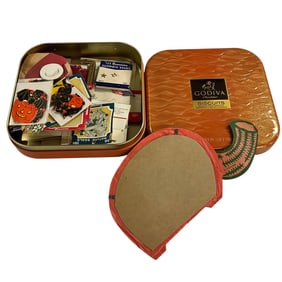 Tin with Ephemera and Halloween Decorations