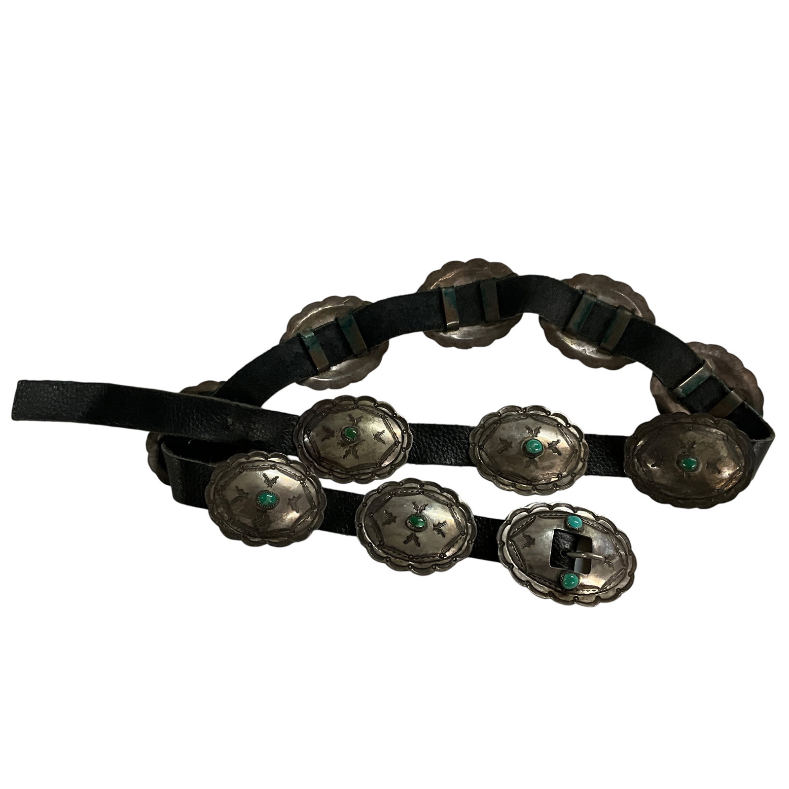 Turquoise Concho Belt: Turquoise Concho Belt. Ten conchos, plus buckle, all with turquoise settings. Conchos are not marked sterling- they appear to be silver plate, or German silver. Approx. 41" long. EL