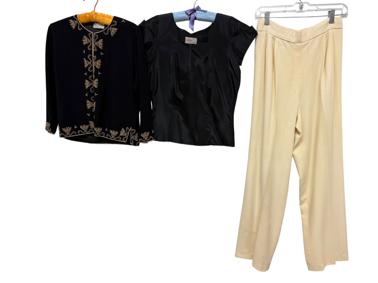 Vintage Clothing: Vintage Bob Mackie wool trousers. Chen Sisters beaded sweater and Alice of California blouse.