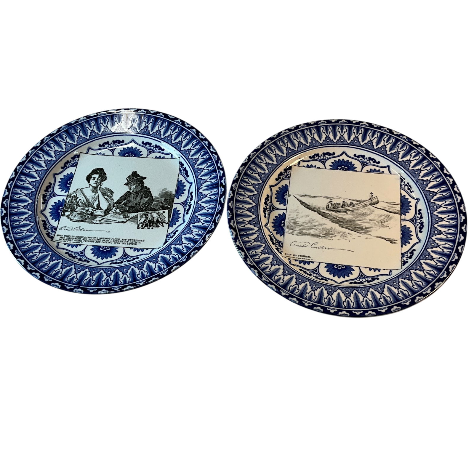 Pair of Royal Doulton "Gibson Girl" Plates: Pair of Royal Doulton "Gibson Girl" Plates. Produced around 1902-1915, featuring black & white reproductions of Charles Dana Gibson's Iconic "Gibson Girl" illustrations inside a cobalt border with an