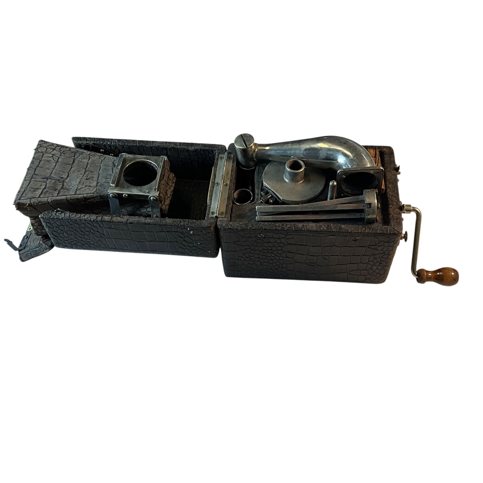 "Peter Pan" Portable Gramophone: "Peter Pan" Portable Gramophone. A curiosity of English origin, with a spoked turntable and a bellows-like leather horn. Folds into a compact camera-like case. With an RCA Bluebird disc with "Mad Dogs