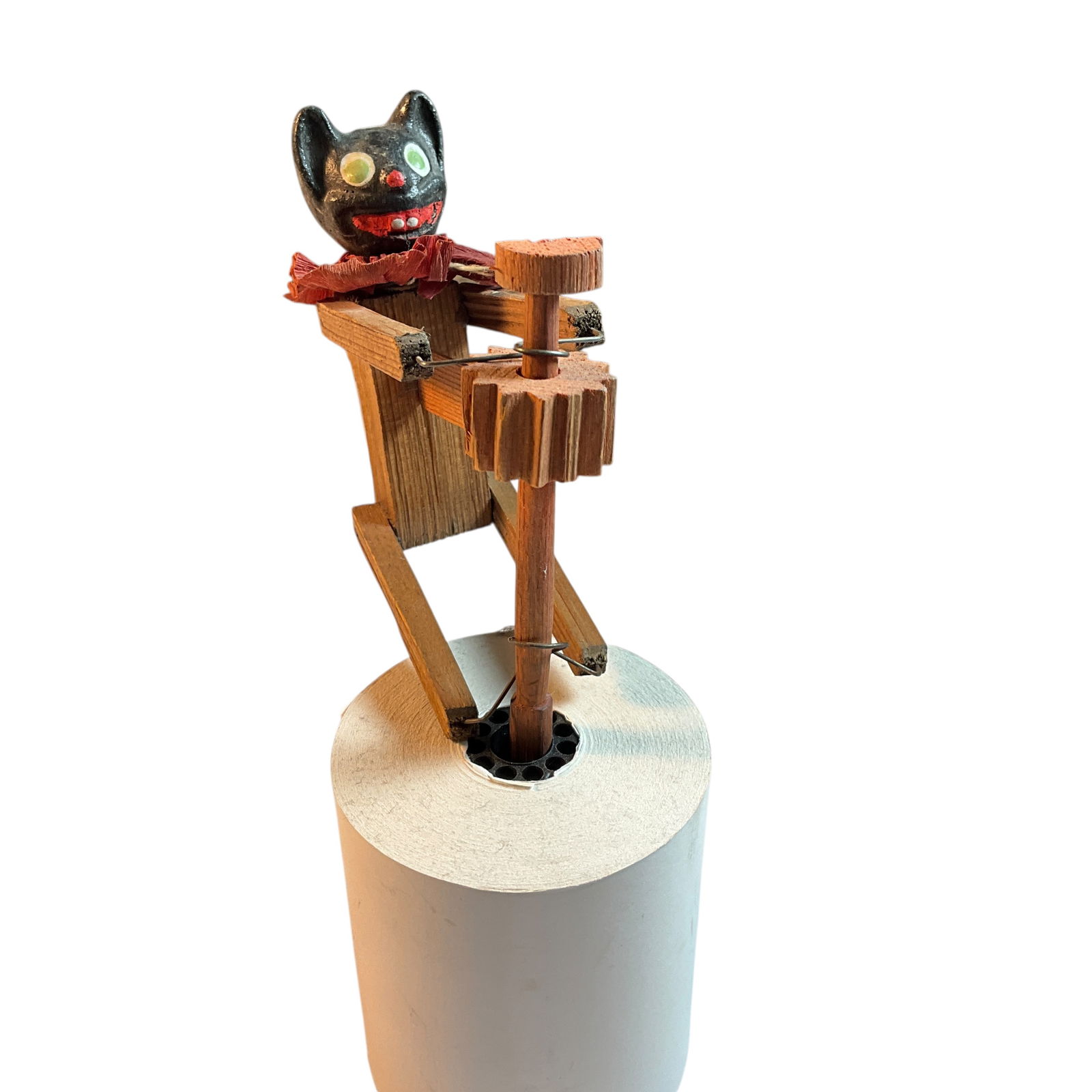 Early Halloween Black Cat Noisemaker: Rare and Early Halloween Black Cat Noisemaker. Painted head with paper collar. Cap on handle is broken, but noisemaker still functions as designed. A great addition to any Halloween collection.