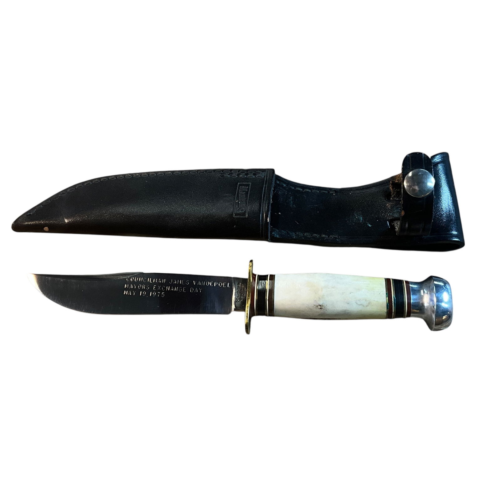 Marbles Gladstone MI Commemorative Knife: Marbles Gladstone MI Commemorative Knife. Marbles fixed blade knife with a 5" blade, antler handle, and aluminum pommel cap. Blade is marked, "Councilman James Vandepoel Mayor's Exchange Day May 19,19