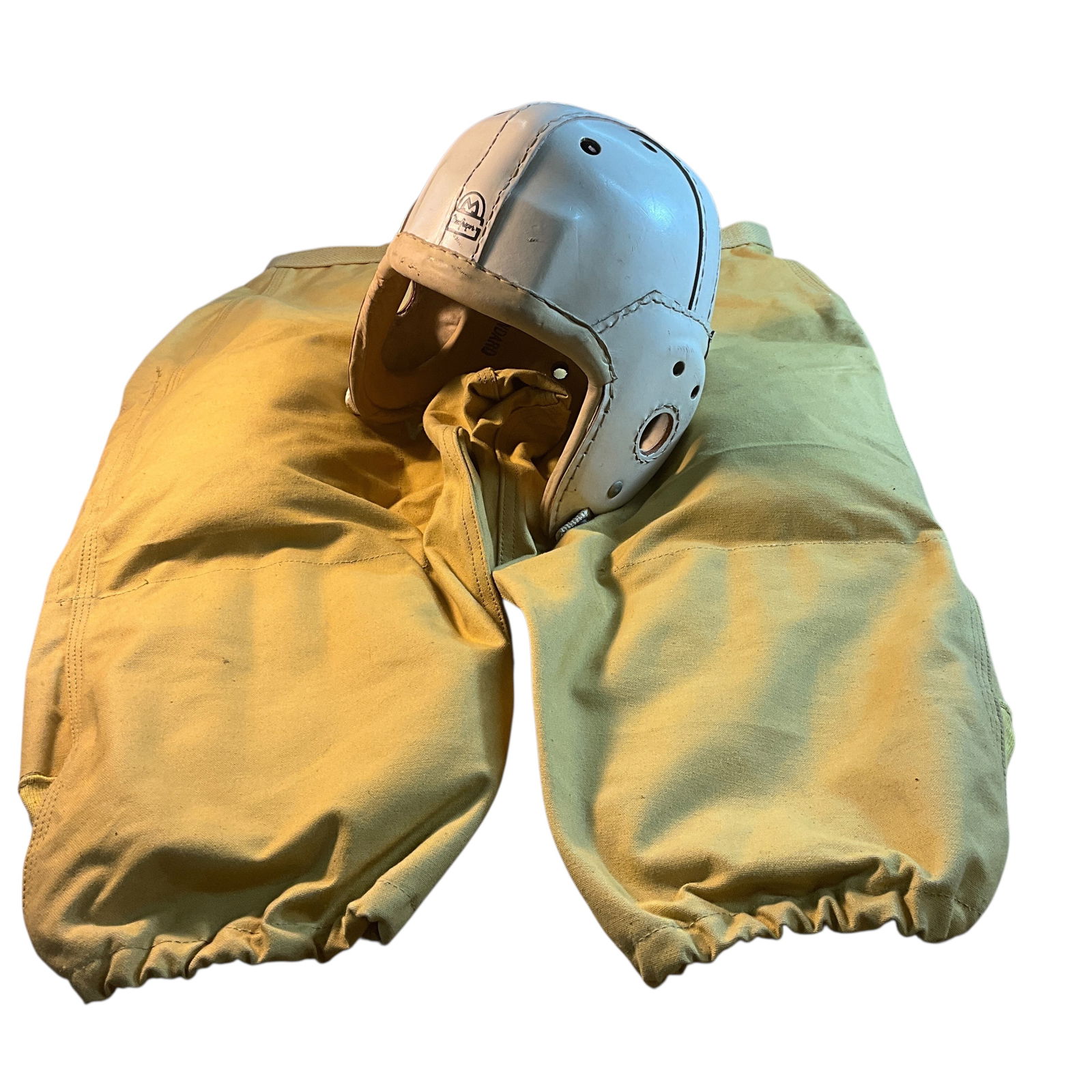 Vintage 1930's MacGregor Leather Football Helmet & Pants: Vintage MacGregor Leather Football Helmet & Pants. New old stock from the basement of a long-time sporting goods store in Holland, MI. The helmet is a MacGregor, size 7 1/8-7 1/4, off-white, no chin s