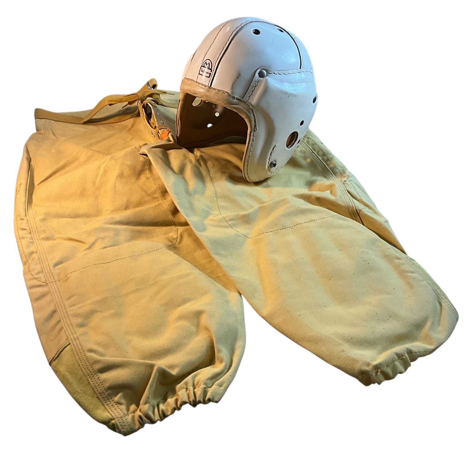 Vintage 1930's MacGregor Leather Football Helmet & Pants: Vintage MacGregor Leather Football Helmet & Pants. New old stock from the basement of a long-time sporting goods store in Holland, MI. The helmet is a MacGregor, size 7 1/8-7 1/4, off-white, no chin s