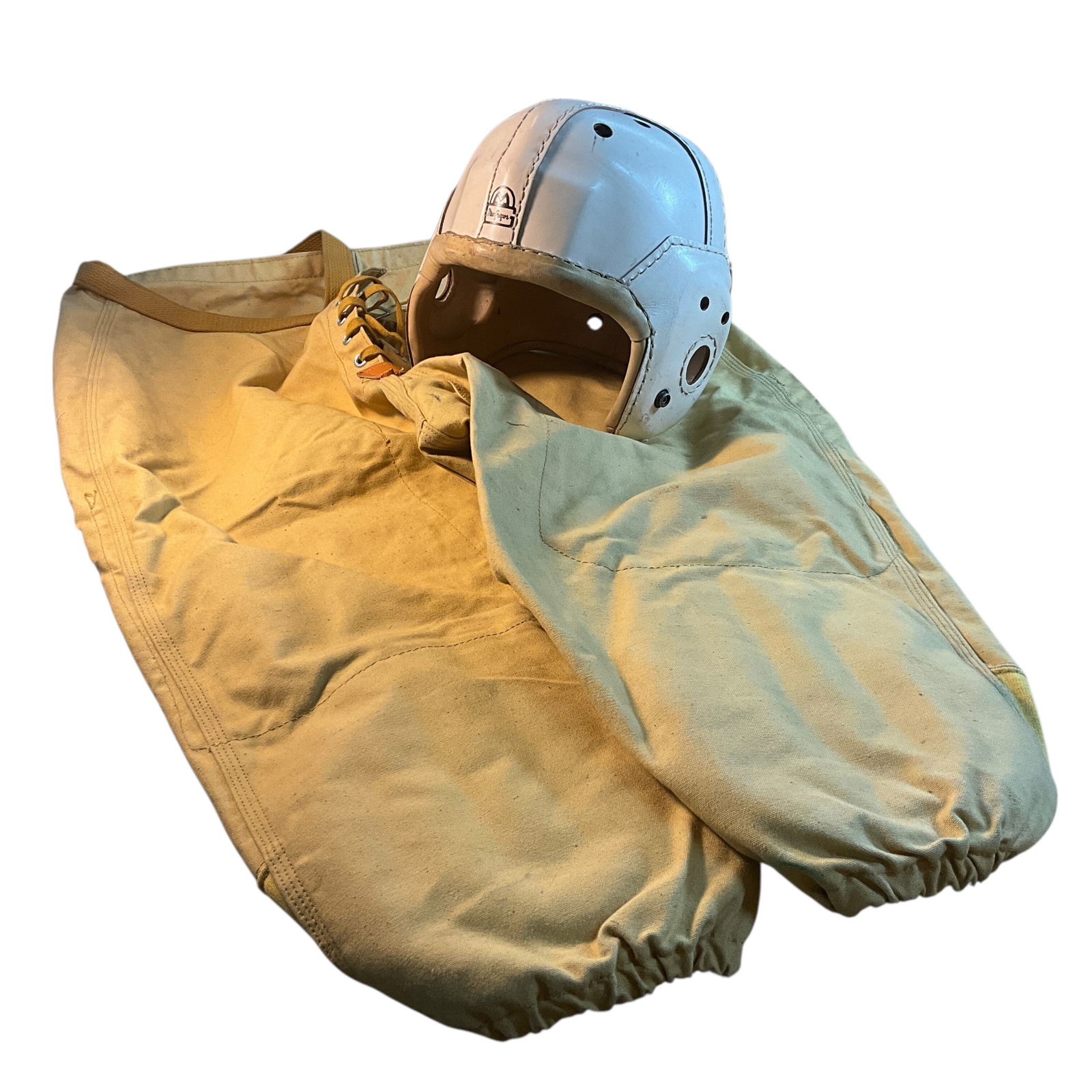 Vintage 1930's MacGregor Leather Football Helmet & Pants: Vintage MacGregor Leather Football Helmet & Pants. New old stock from the basement of a long-time sporting goods store in Holland, MI. The helmet is a MacGregor, size 7 1/4-7 3/8, off-white, no chin s