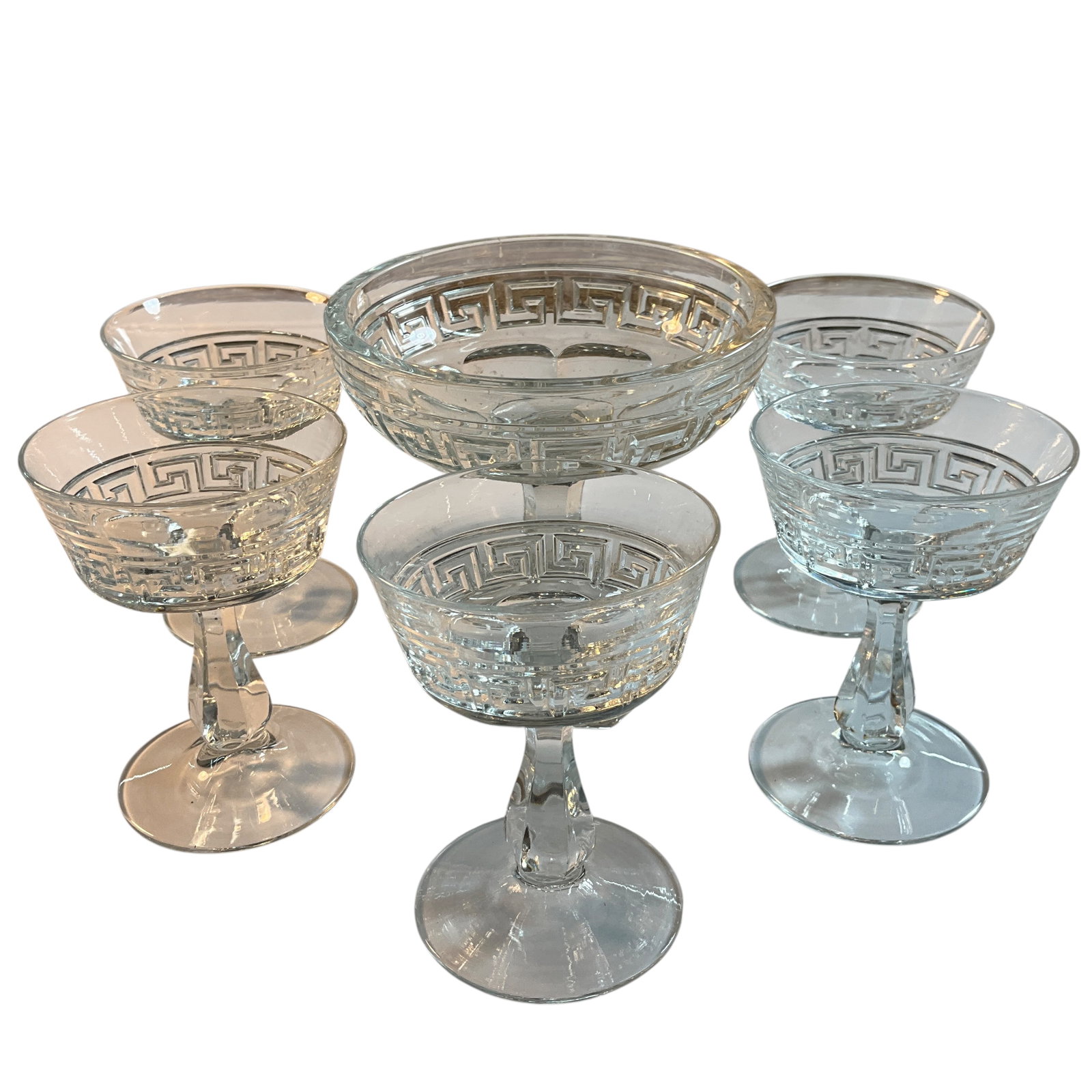 Heisey Greek Key Pattern- Compote & Champagnes: Heisey Greek Key Pattern- Compote & Champagnes. A small 5" high compote and five champagne glasses. No chips noted on rims or bases.