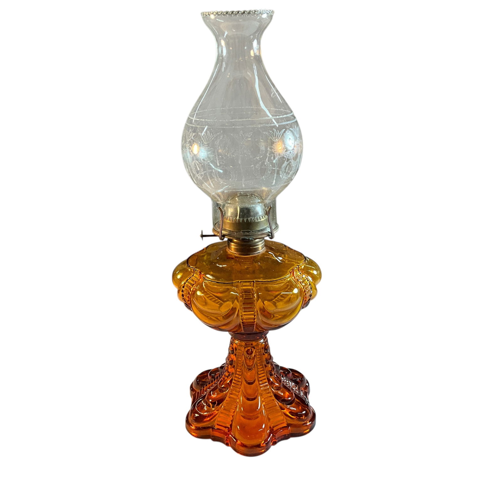 Victorian Amber Pattern Glass Oil Lamp: Victorian Amber Pattern Glass Oil Lamp. Base has a draped pattern. Approx. 19" tall with shade.