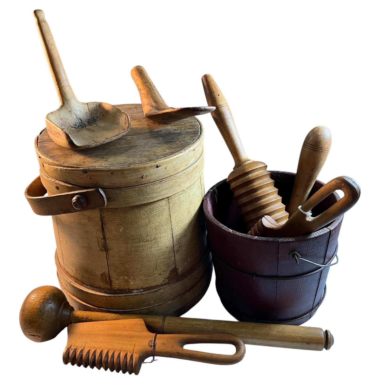 Huge Lot of Antique Treenware: Huge Lot of Antique Treenware. A nice painted firkin, a small wooden bucket, butter paddles, rollers, and a masher/tenderizer that you could use as a war club. There are also a couple of two piece mir