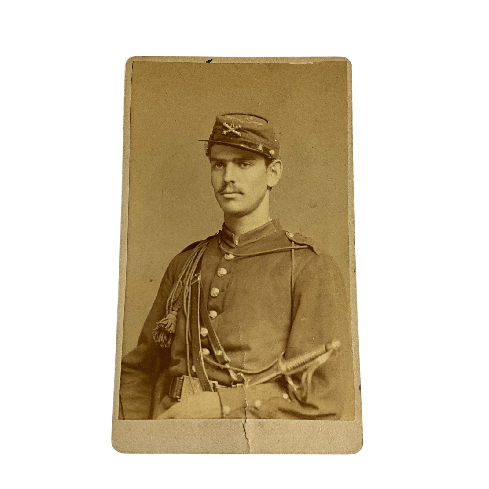 Carte de Visite Photo of an Unknown Civil War Cavalryman: Carte de Visite Photo of a Civil War Cavalryman. A union enlisted cavalryman posing with his saber. Boston photographer's address on back.