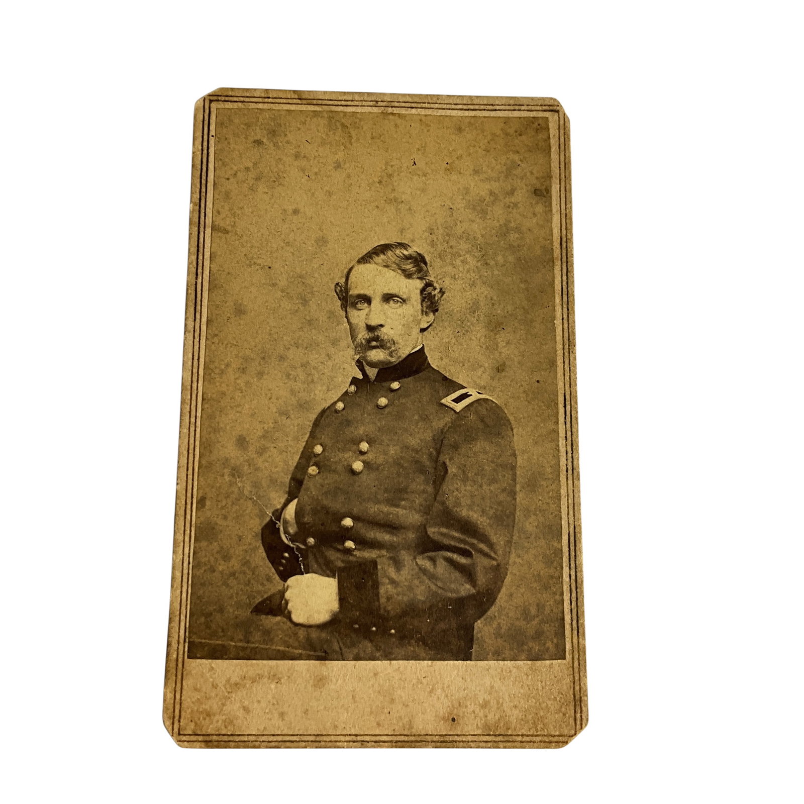 Carte de Visite Photo of an Unknown Civil War Officer: Carte de Visite Photo of an Unknown Civil War Officer. It is hard to tell from the photo, but his shoulder board appears to have one star, which would make him a Brigadier General. The photographer's 