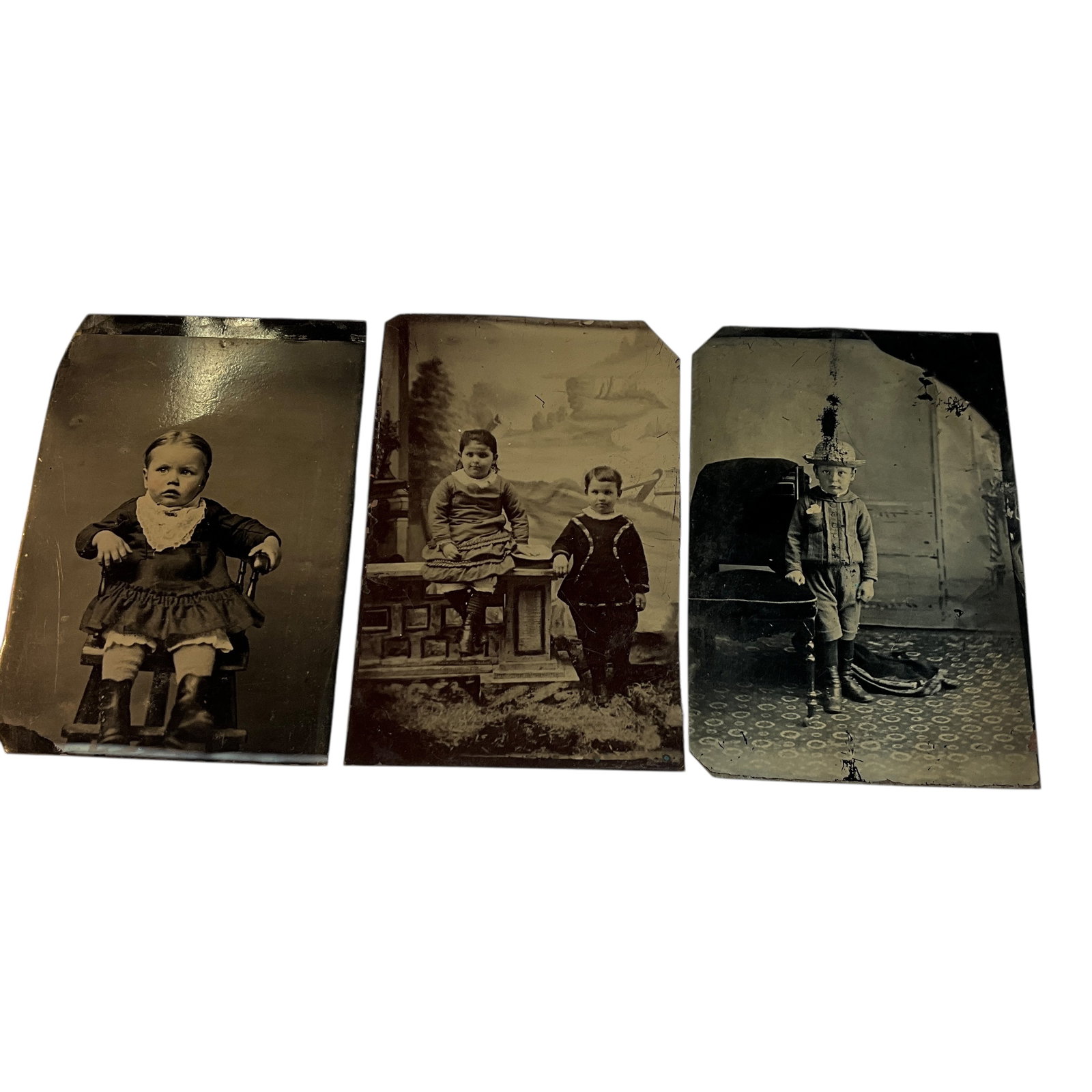 Three Tintypes of Victorian Children: Three Tintypes of Victorian Children. Carte de Visite size tintypes of three lovely Victorian children. There are no cases or sleeves for these photos.