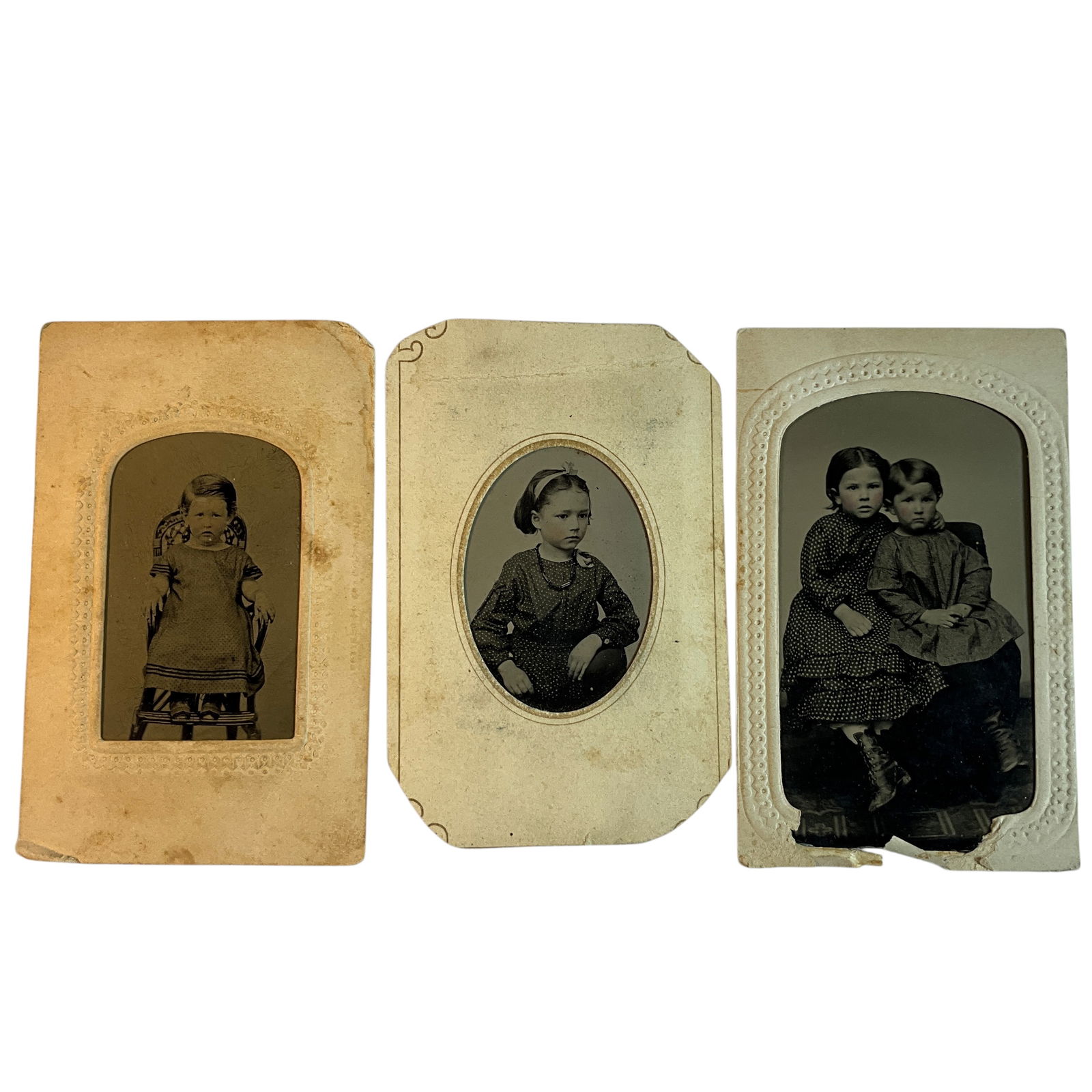 Three Tintypes of Victorian Children: Three Tintypes of Victorian Children. Carte de Visite size tintypes in original paper sleeves of three lovely Victorian children.