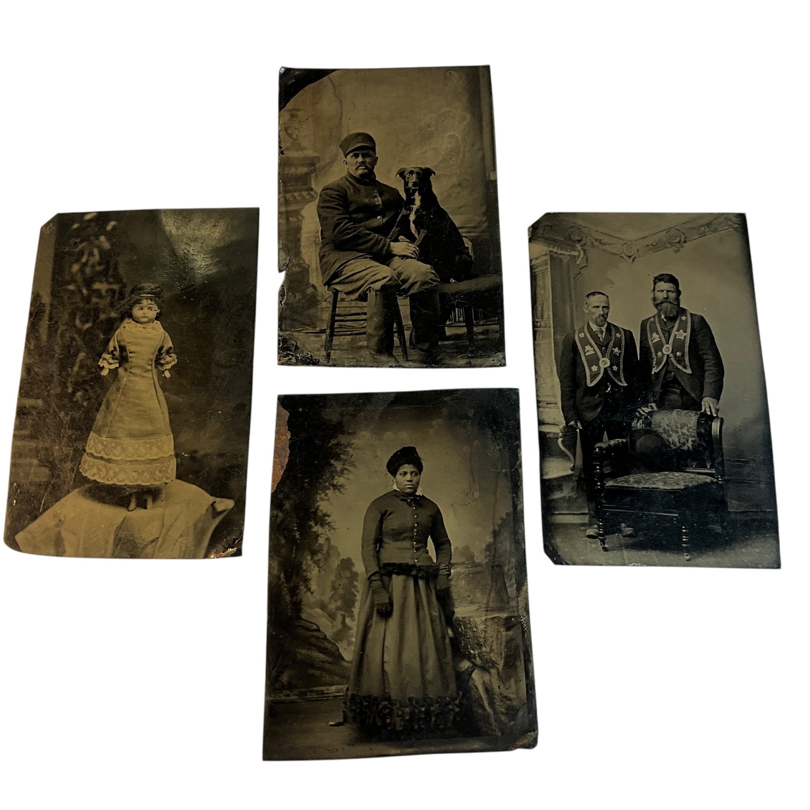 Four Victorian Tintypes, Including Black Americana: Four Victorian Tintypes, Including Black Americana. Four interesting 19th Century tintypes- A well dressed young black woman, two gentlemen in Masonic garb, a wonderful photo of an eastern European im