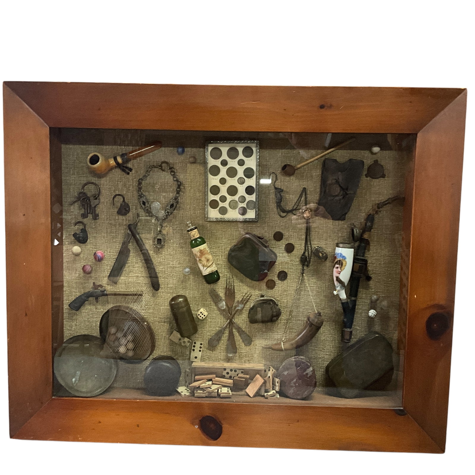 Shadowbox of Victorian/Vintage items: Shadowbox of Victorian/Vintage items. Items are all associated with Martin Keunig, a country preacher who lived in the Holland, MI area. Items include Vintage pipes, keys, straight razor, antique marb