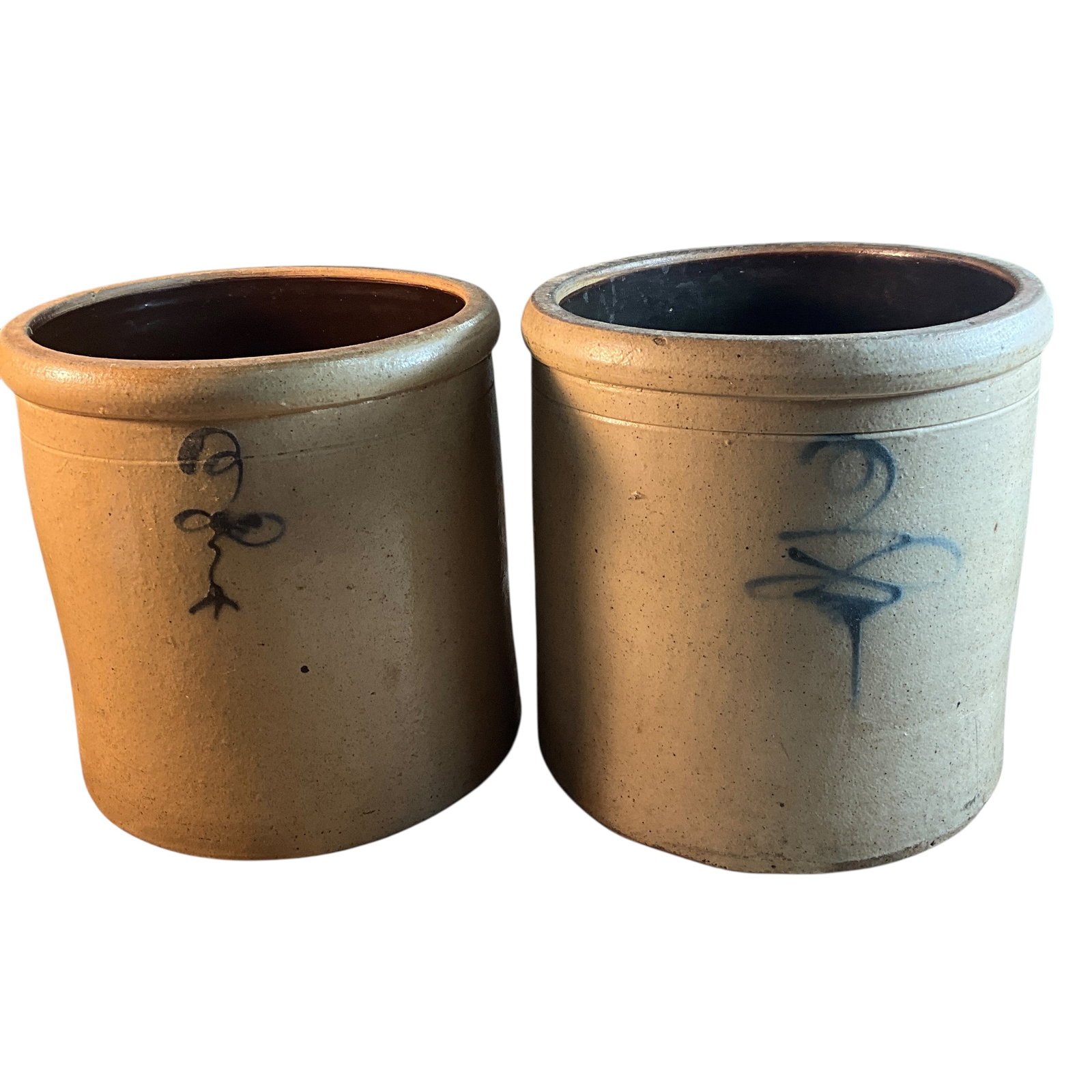 Pair of Salt Glazed 2 Gallon Crocks: Pair of Salt Glazed 2 Gallon Crocks. Nearly identical, with rolled rims, an incised band near the top, and cobalt stylized "2" markings. Each is approx. 9.5"high, and 9" in diameter. Both are in good 