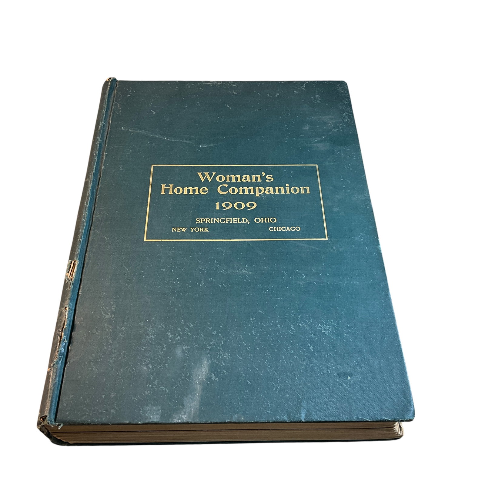 Bound Volume of 1909 Women's Home Companion Magazine: Bound Volume of 1909 Women's Home Companion Magazine. Oversize volume with some loose/missing pages, edge wear, small tears, foxing, and fading. Great old ads!