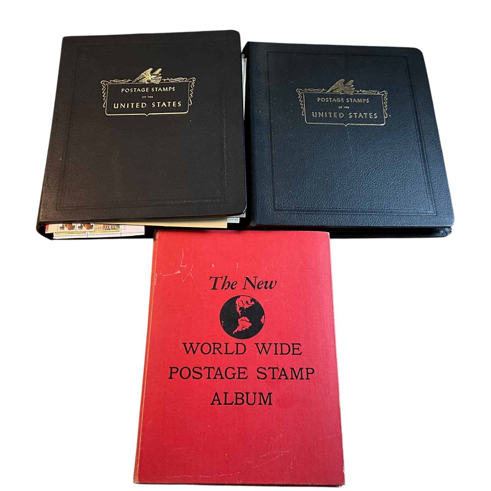 Stamp Collection- Three Large Binders: Stamp Collection- Three Large Binders. Two Binders of United States Stamps, and one binder of world stamps. plus sheets and single loose stamps.