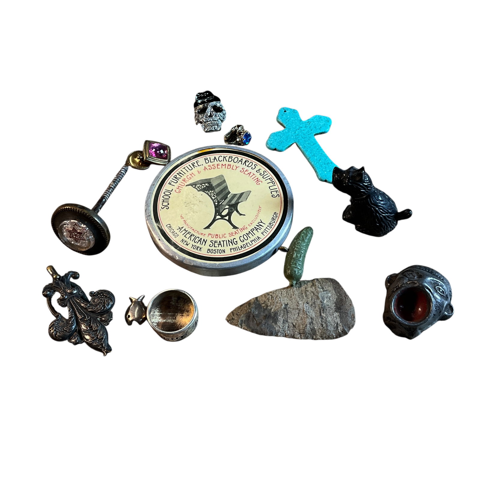 Eclectic Lot of Smalls, Incl. American Seating Calendar: Eclectic Lot of Smalls, Incl. American Seating Calendar. An American Seating Calendar ten year pocket calendar (1910-1920), plus an ancient stone point, a Victorian china head picture hanging nail, a 