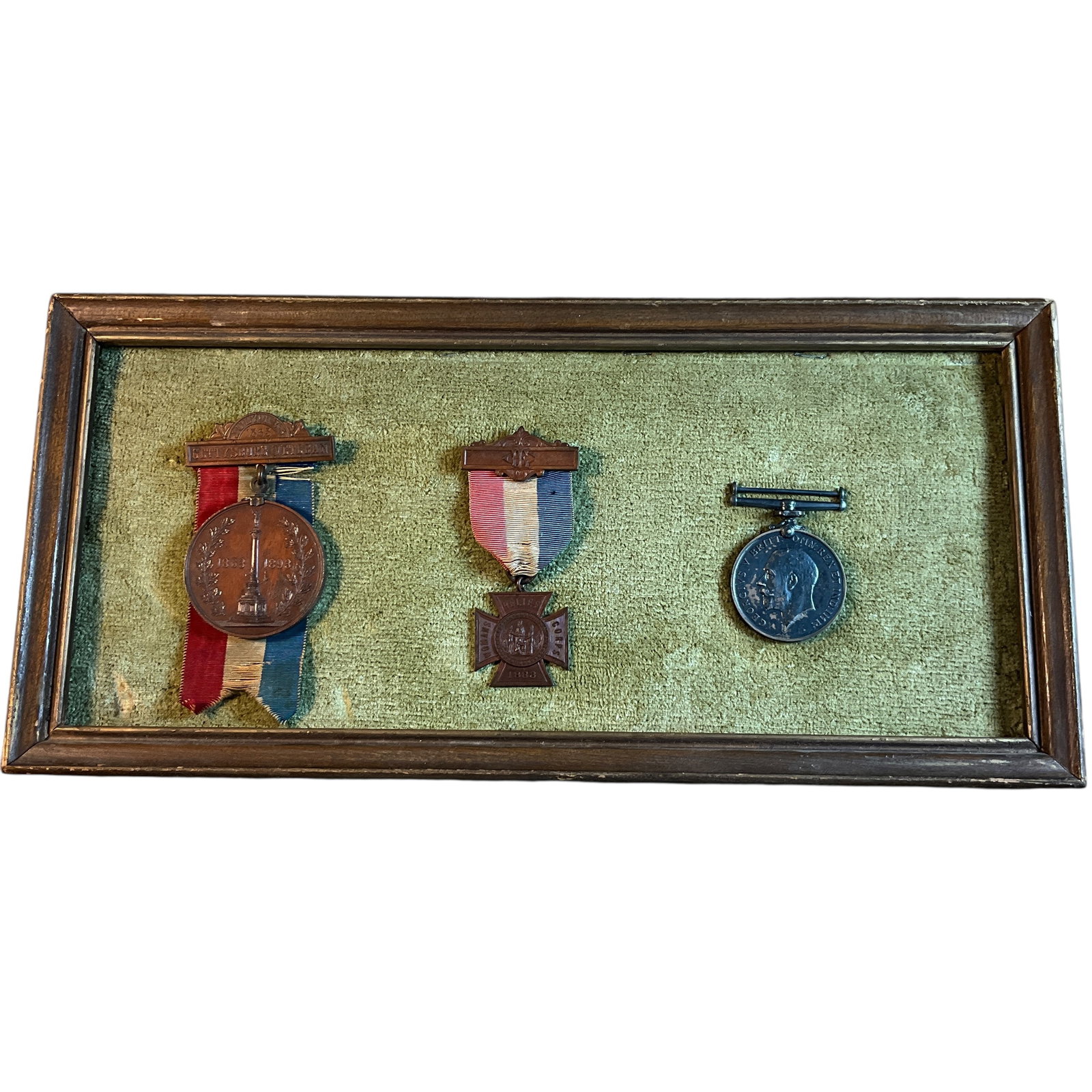 Framed Medals- Civil War, WWI: Framed Medals- Civil War, WWI. A fairly rare Gettysburg Veterans Medal, A Women's Relief Corps Medal, dated 1883. There is also a British WAr Medal, awarded to veterans of the First World War. Both Am