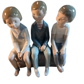 Lladro "Three Boys Sitting." Figurine