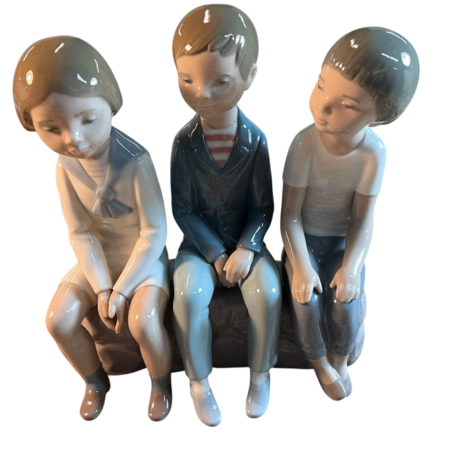 Lladro "Three Boys Sitting." Figurine: Lladro "Three Boys Sitting." Figurine. Designed by Juan Huerta, this was only produced from 1977 to 1979.