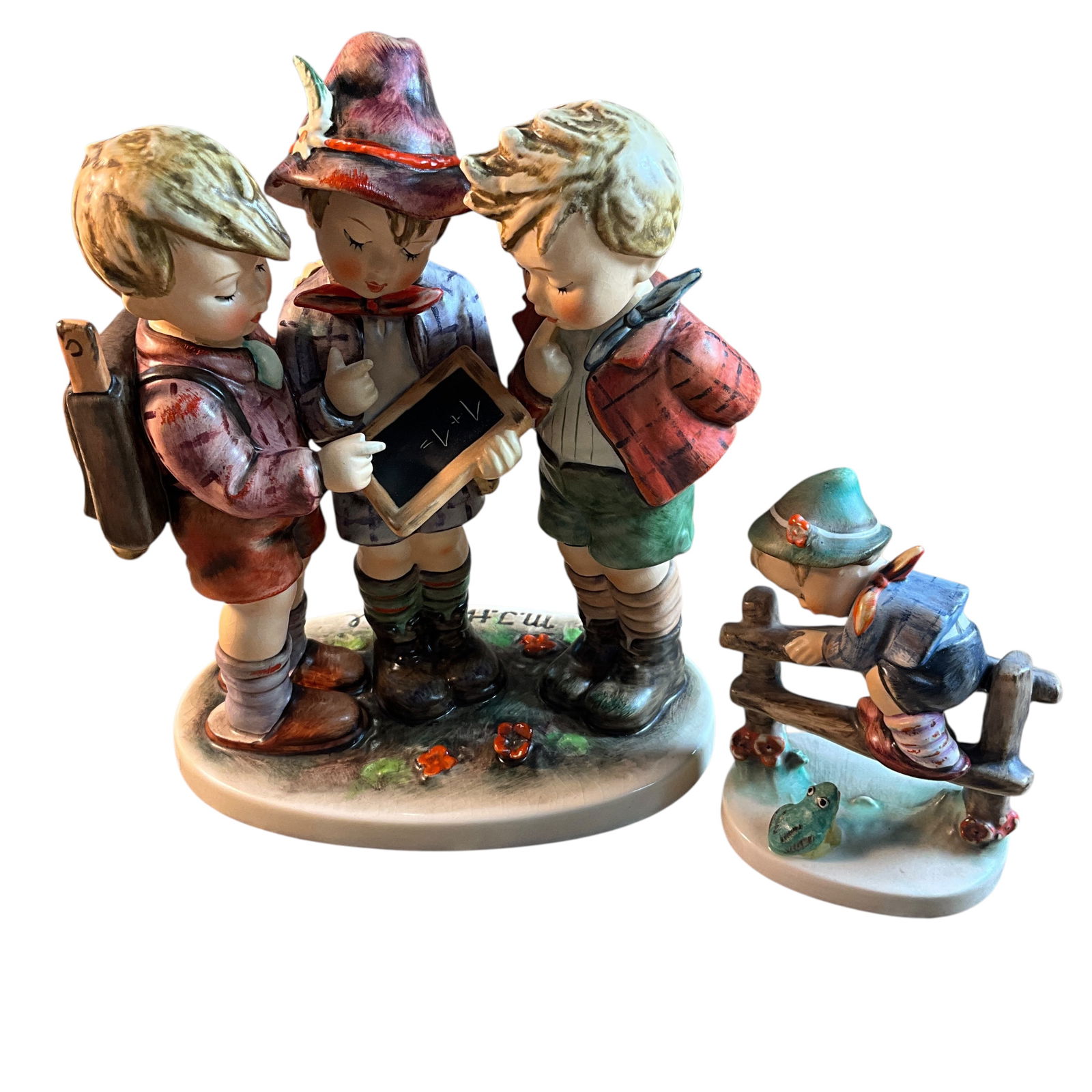 Hummel Figurines: Hummel Figurines. "Retreat to Safety" (1948), and a larger grouping, "School Boys," first produced in 1935. This example was produced between 1972 and 1979, and is approx. 8" high.