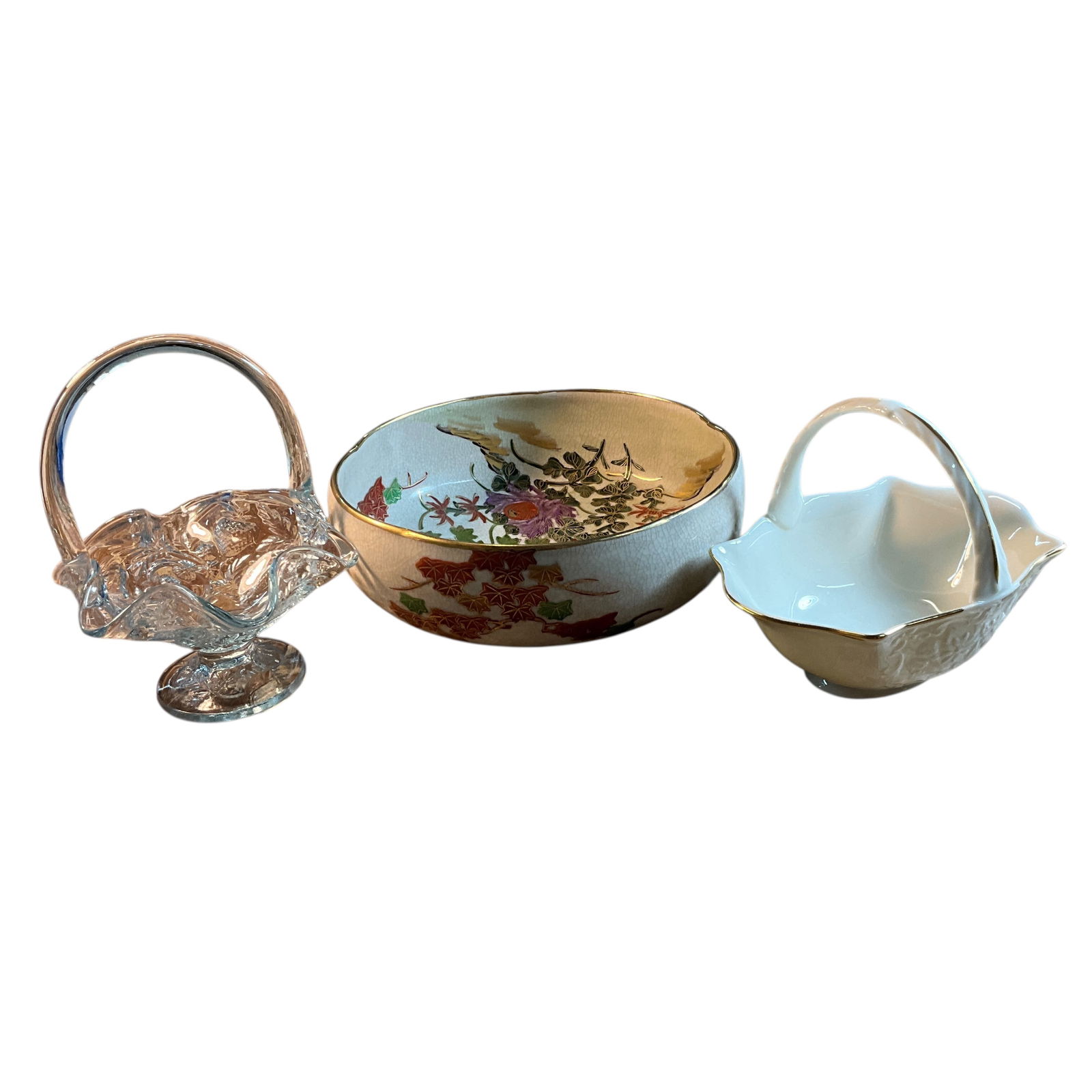 Three Glass & Porcelain Baskets & Bowls: Three Glass & Porcelain Baskets & Bowls. A Chrysanthemum decorated Japanese Kutani bowl, a Lenox Sans Souci basket, and a Fenton Ice Blue Aqua ruffled strawberry basket.