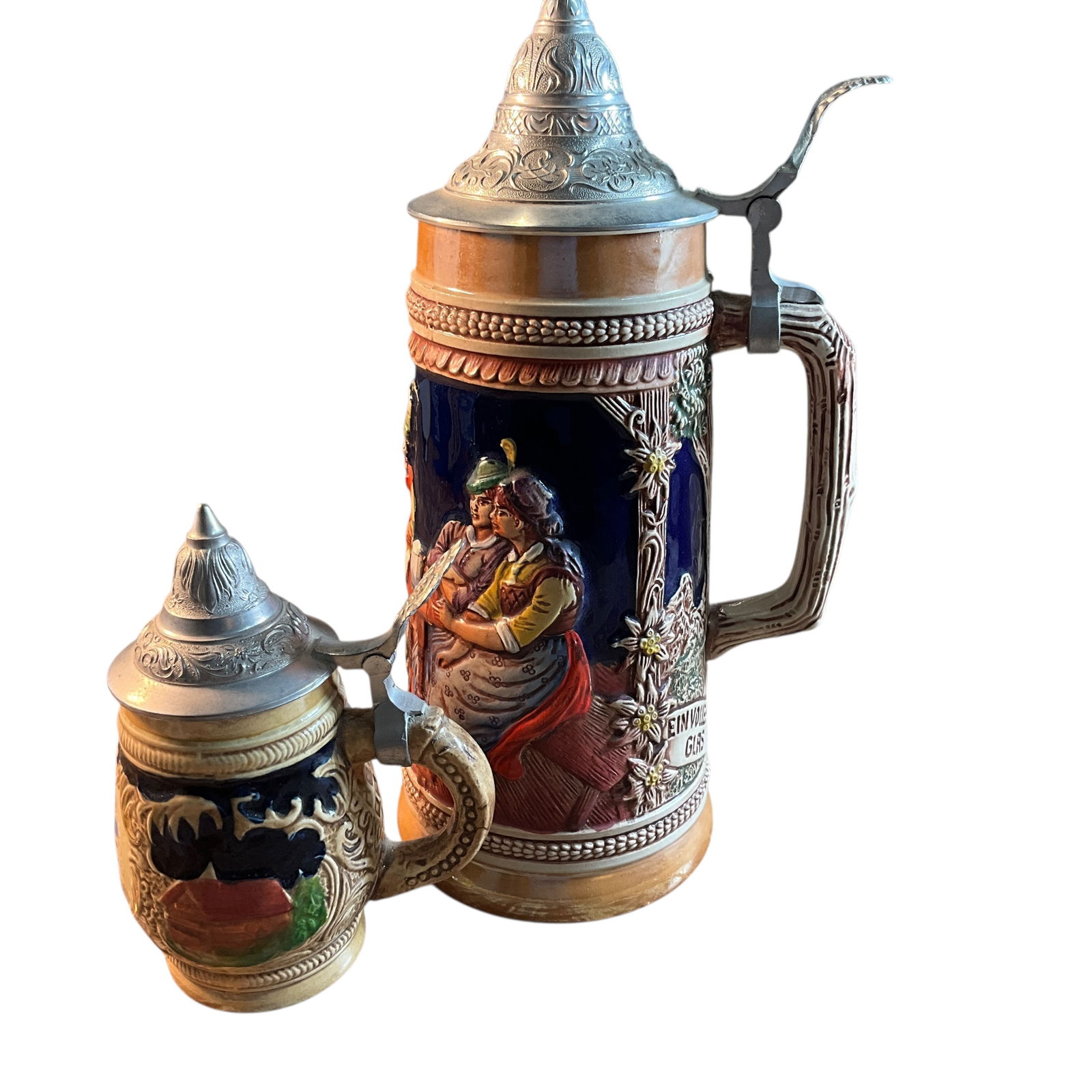 Two German Figural Steins: Two German Figural Steins. A West German Gerz, and a small unmarked souvenir stein from Rothenburg. Both have pewter lids.