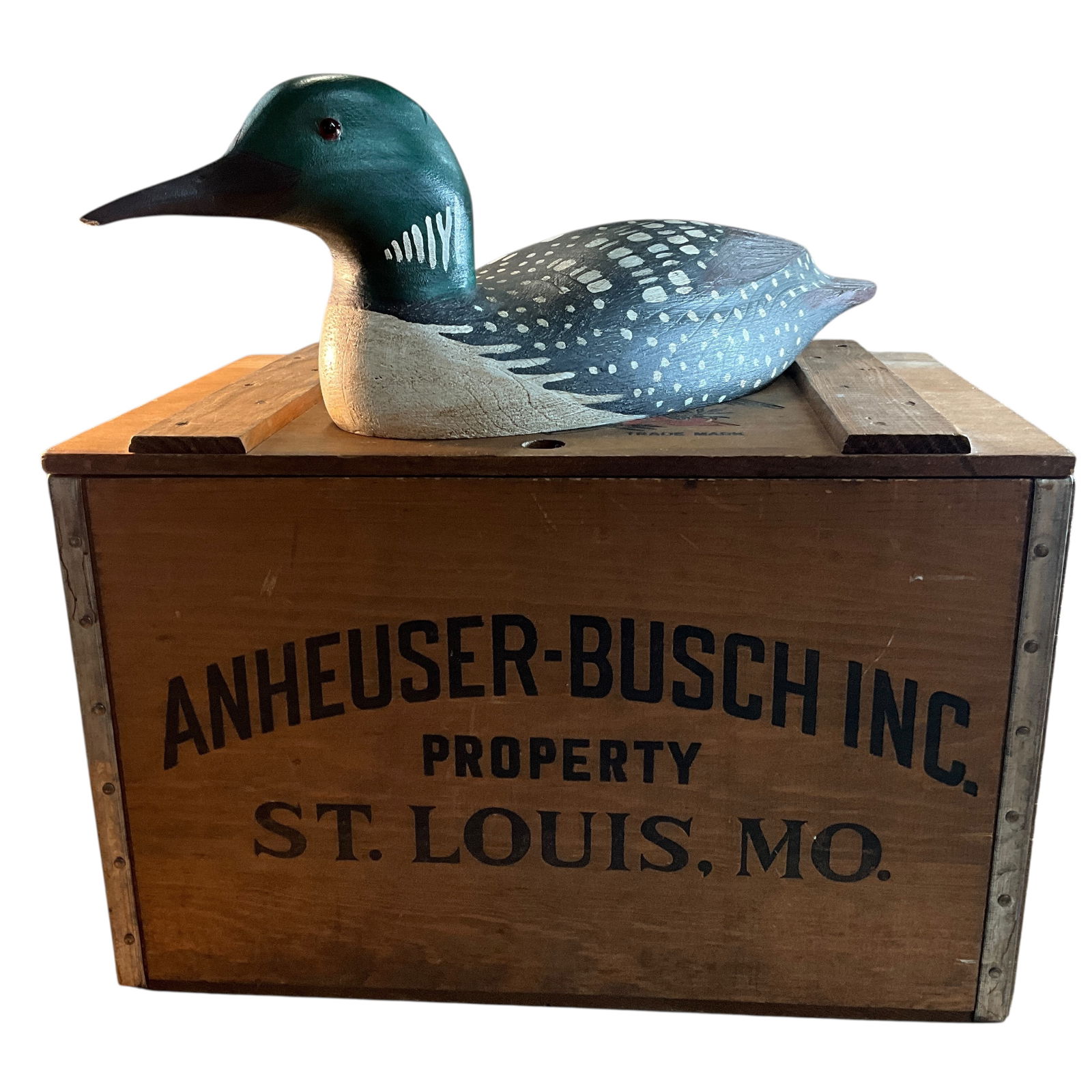 Hand Carved and Painted Loon Decoy and Budweiser Crate: Hand Carved and Painted Loon Decoy and Reproduction Budweiser Crate. Decoy is stamped "RJK" on bottom. Slight damage to the tip of the beak. Reproduction Anheuser Busch storage crate provides a nice s