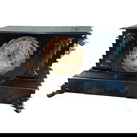 Ansonia Iron Case Mantel Clock: Ansonia Iron Case Mantel Clock. Has pendulum, but no key. Some deterioration to clock face. Has not been function tested.