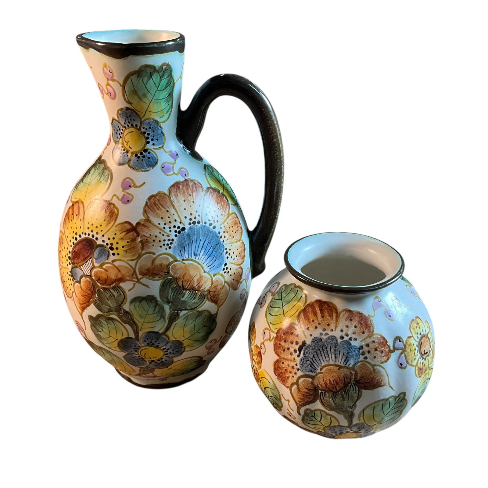 Dutch Gouda Pottery: Dutch Gouda Pottery. an 8" pitcher and a 4" vase, both with colorful hand painted flowers and foliage.