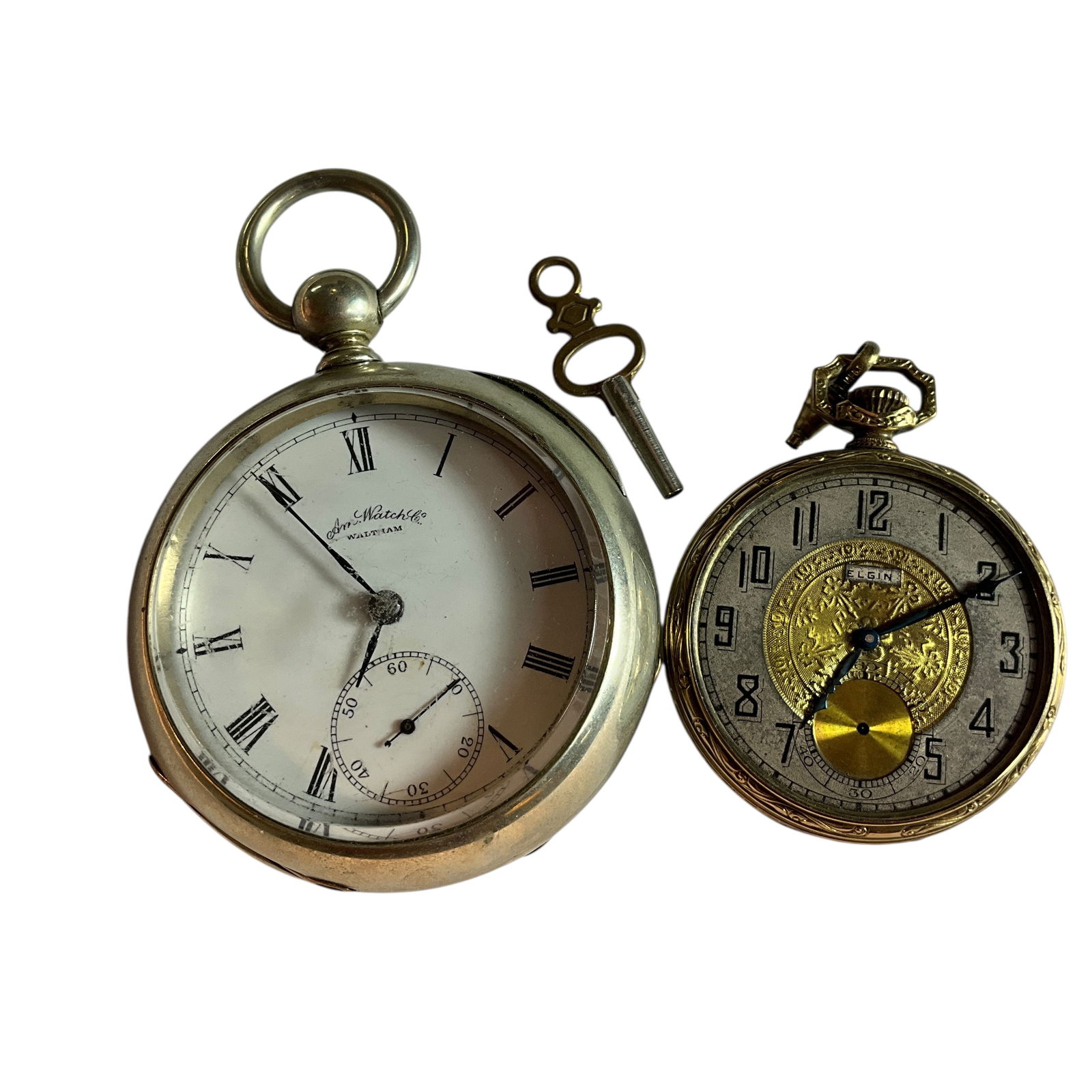 Two Antique Pocket Watches: Two Antique Pocket Watches. A Waltham American Watch Co. pocket watch, nickel plated case and a tiny key for winding. The other is a small but very nice Elgin that is unfortunately missing the crystal