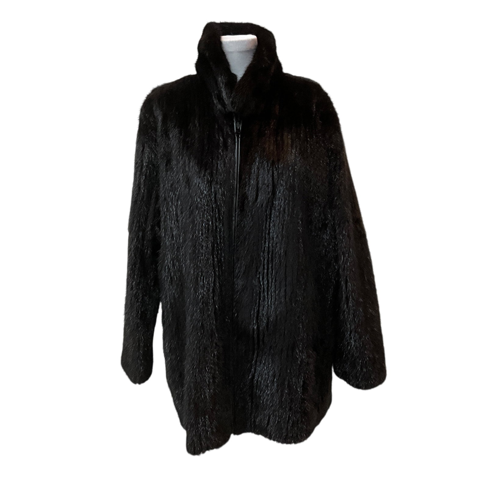 Leather and Fur Coat: Wonderful reversible fur coat. Leather on one side and genuine fur (Mink, I think) on the other. Very nice coat.