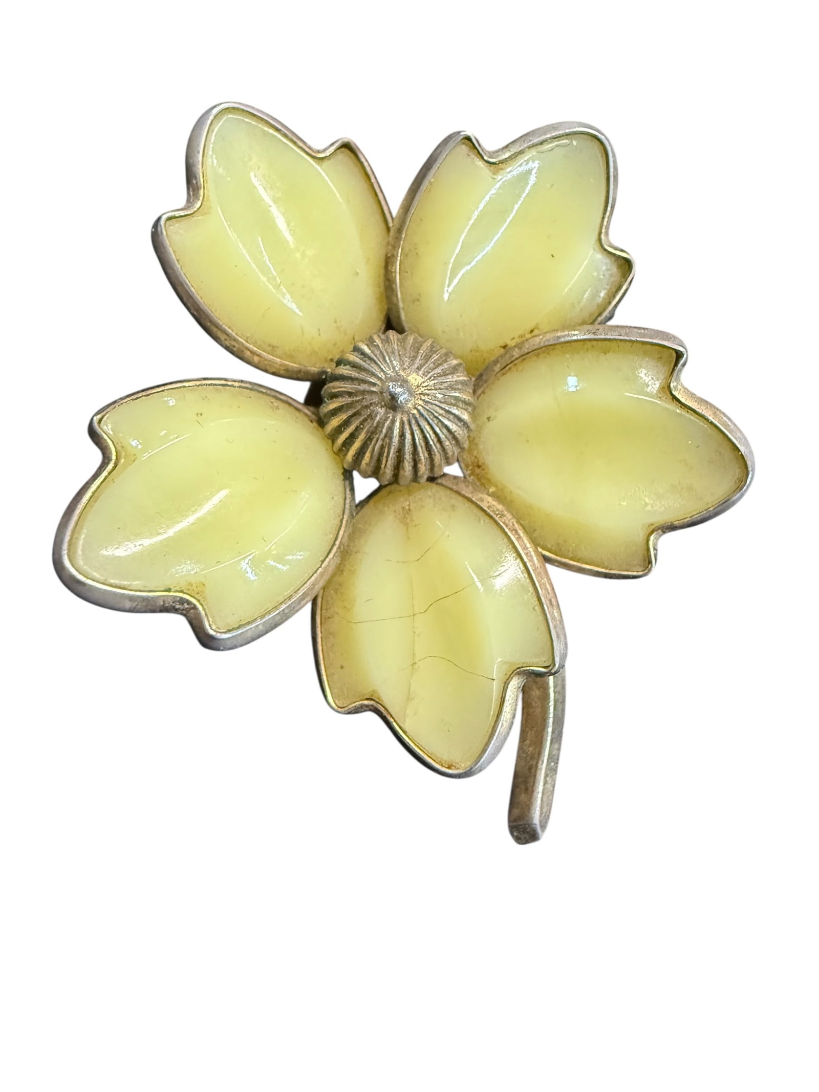 Vintage Trifari Brooch-True Vaseline Glass: Uranium Glass-very reactive. Slight pressure cracks in some of the petals. Still very sturdy.
