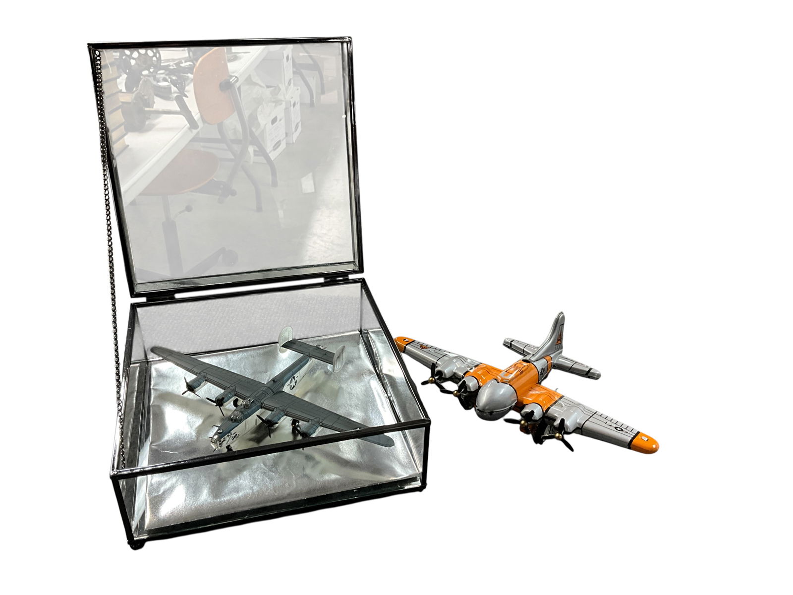 Diecast/Toy Airplanes, Glass Display Box: Diecast/Toy Airplanes, Glass Display Box. A Key wind (with key) lithographed tin B-17 bomber, and a dies cast model of a PB4Y-1 (Navy version of the B-24 Liberator) Bomber in a leaded glass display