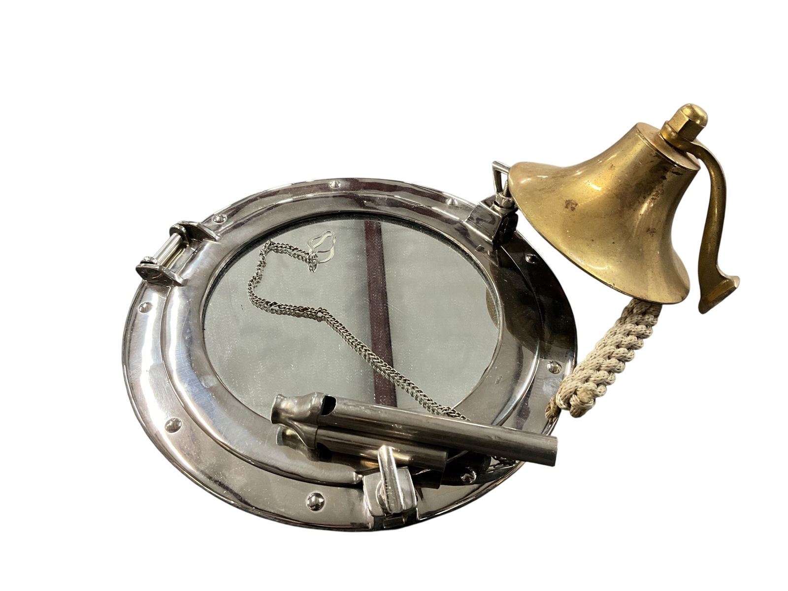 Porthole Mirror, Ship's Bell, Conductor's 3 Cell Whistle.: Porthole Mirror, Ship's Bell, Conductor's 3 Cell Whistle. Porthole mirror could be hung or used as a tray. Small brass ship's bell with a braided pull, and a nice tone. Nickel plated brass three cell