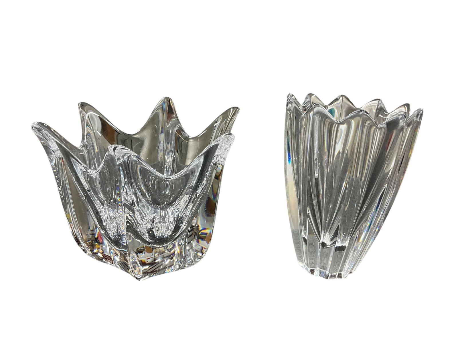 Pair of Signed Orrefors Crystal Vases: Pair of Signed Orrefors Crystal Vases. Great Swedish Crystal, both signed on bottom. tallest is 6" high, widest is 6.25" wide.