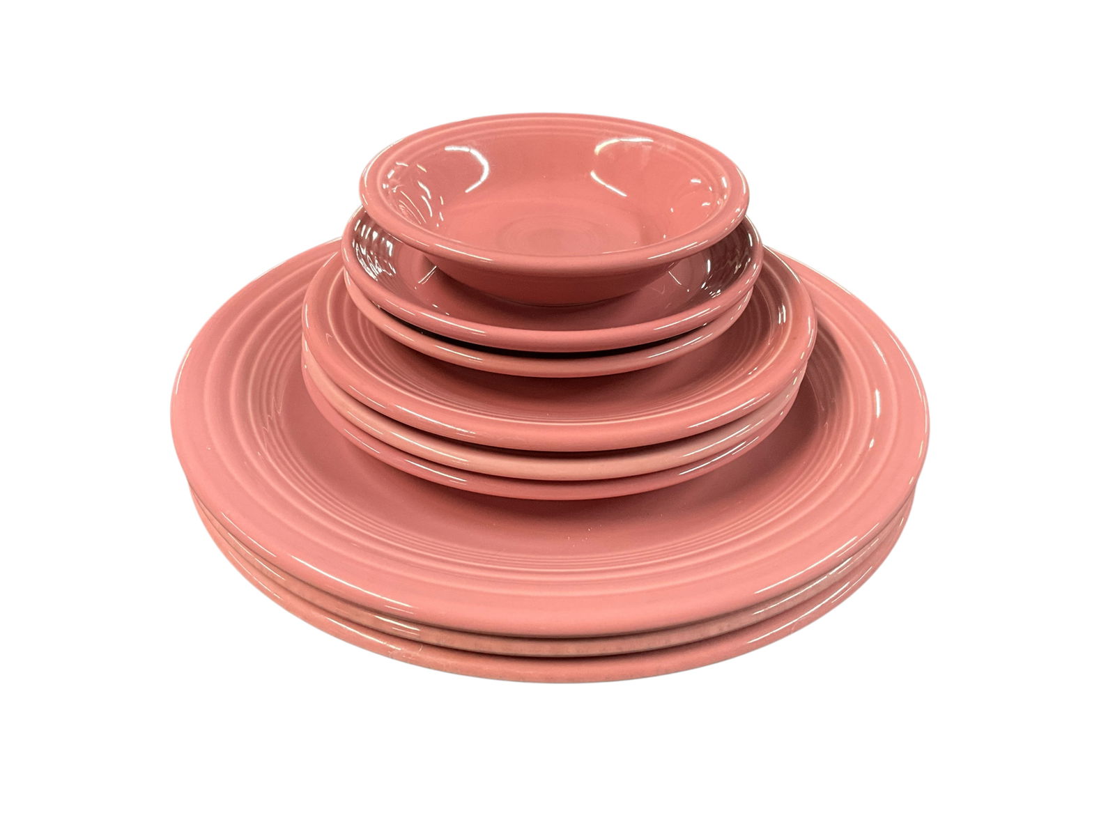 Fiestaware Grouping, Rose Colorway: Fiestaware Grouping, Rose Colorway. The Rose colorway was produced from 1986-1998. This group consists of a 5" sauce dish, two 6" saucers, three 7" plates, and three 10.5" dinner plates. No noted