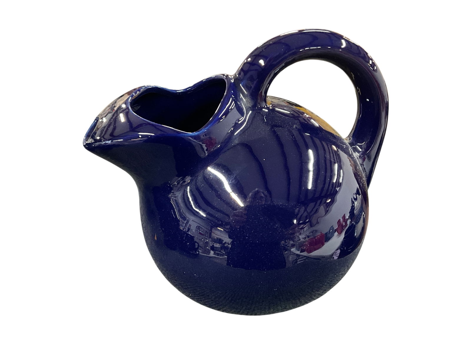 Fiestaware Grouping, Cobalt Blue Colorway: Fiestaware Grouping, Cobalt Blue Colorway. The Cobalt colorway was produced from 1986-2021. This group consists of an 8" Round and an 8" urn pitcher, Rangetop salt & pepper shakers, and a figure 8
