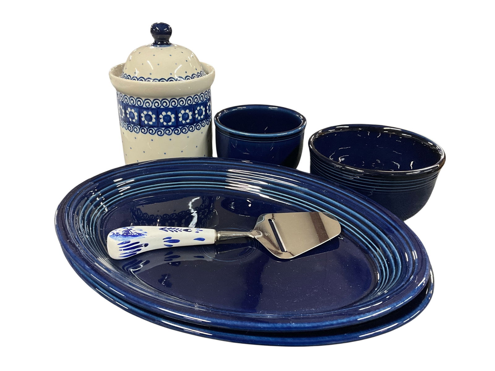 Fiestaware Grouping, Cobalt Blue Colorway: Fiestaware Grouping, Cobalt Blue Colorway. The Cobalt colorway was produced from 1986-2021. This group consists of two 13.5" oval trays, a 5" Round and a 6" round deep bowl. No noted cracks or chips.