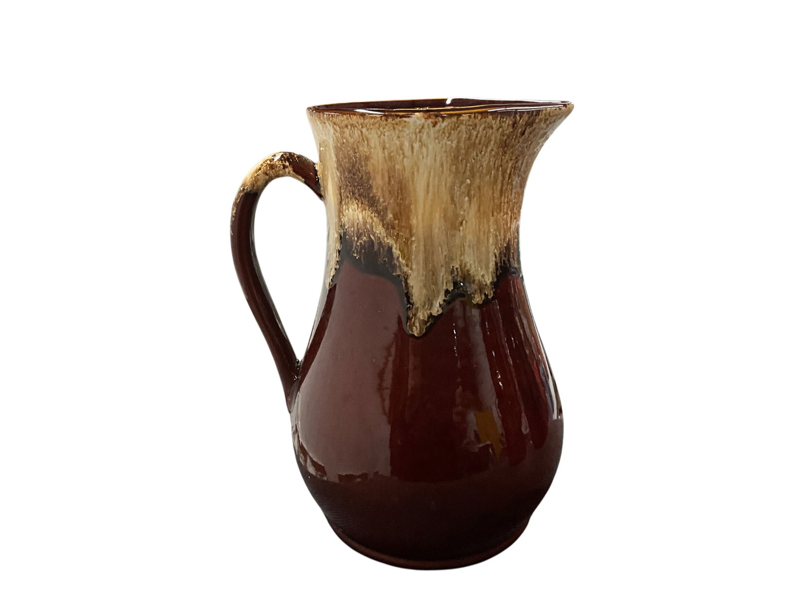 Trio of Bennington Style Pitchers: Trio of Bennington Style Pitchers- an 11" Robinson Ransbottom, an 11.5" Hull with lid, and an 8.25" pitcher marked only with "USA" on bottom, that is likely Shawnee.