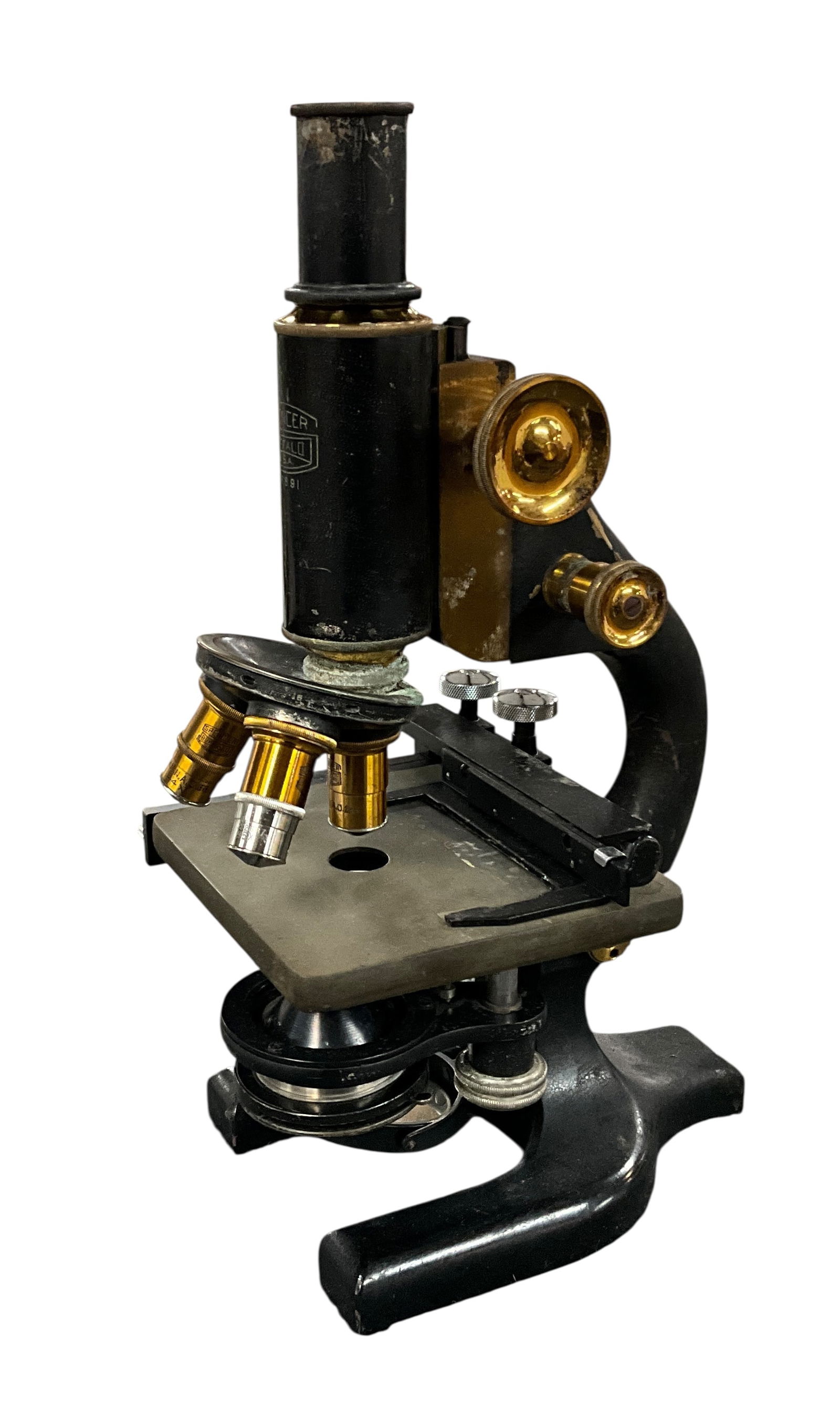 Vintage Spencer Monocular Microscope: Vintage Spencer Monocular Microscope, manufactured by the Spencer Lens Company of Buffalo, New York. The three turret microscope likely dates from the 1920's. No case is included.